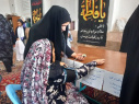 برپایی میز خدمت شبکه بهداشت و درمان خنداب در نماز جمعه شهر جاورسیان به مناسبت هفته بسیج