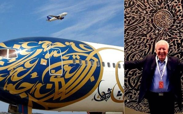 هنرمندی که روی هواپیما نقاشی میکند